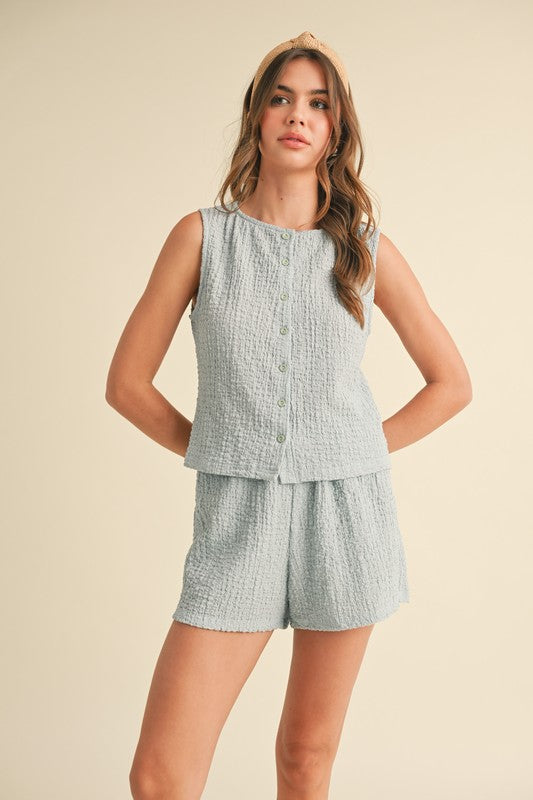 Textured knit button tank top and shorts set in light blue, perfect for trendy summer outfits.