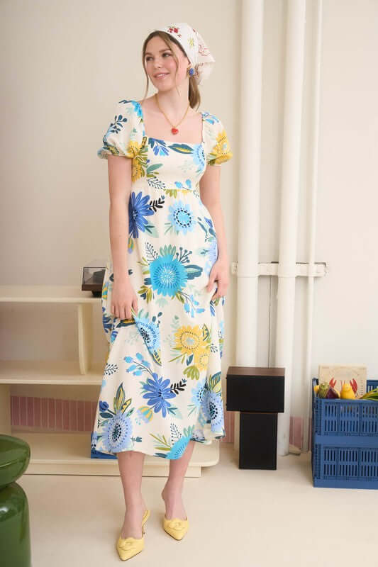 Florence Maxi Dress featuring square neckline, short puff sleeves, floral print, perfect for summer, made of rayon and linen.