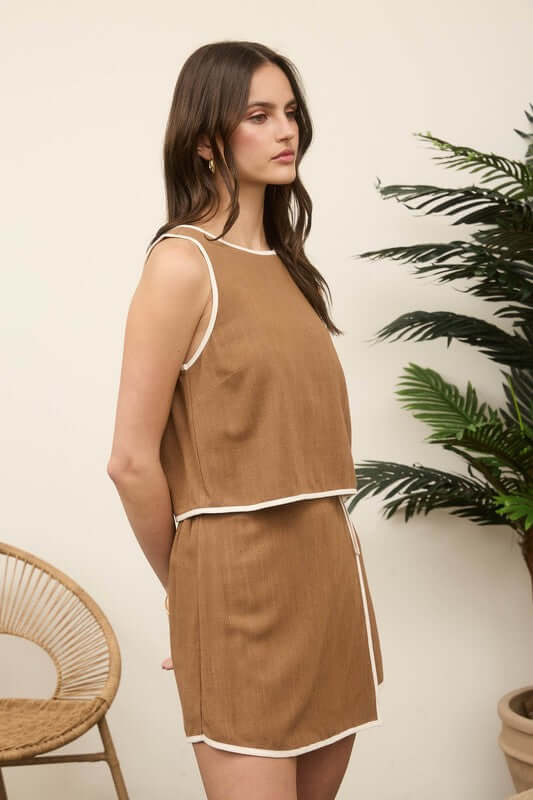 Maddie Linen Skort Matching Set featuring a high waist, wrap detail, and side tie in a stylish blend of rayon and linen.
