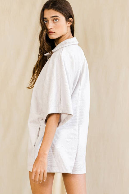 Bucketlist Solid Textured Oversize Button Up Collared Romper