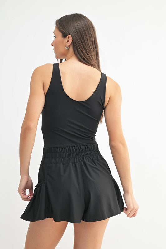 Flounce & Flow Active Romper in Black