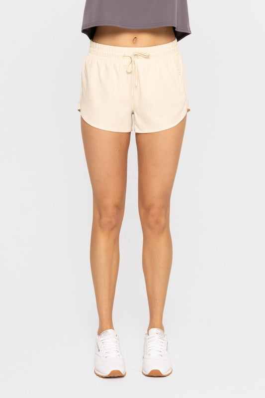 Chicease Drawcord Mini Athletic Shorts in Natural