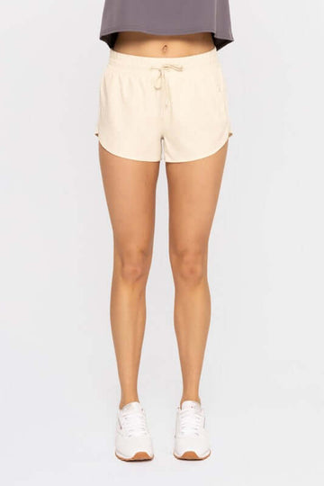 Chicease Drawcord Mini Athletic Shorts in Natural